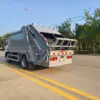 东风华神v3-hzh5080zyse6lh-7方-压缩式垃圾车-后侧45度-01 东风华神V3 7方压缩式垃圾车