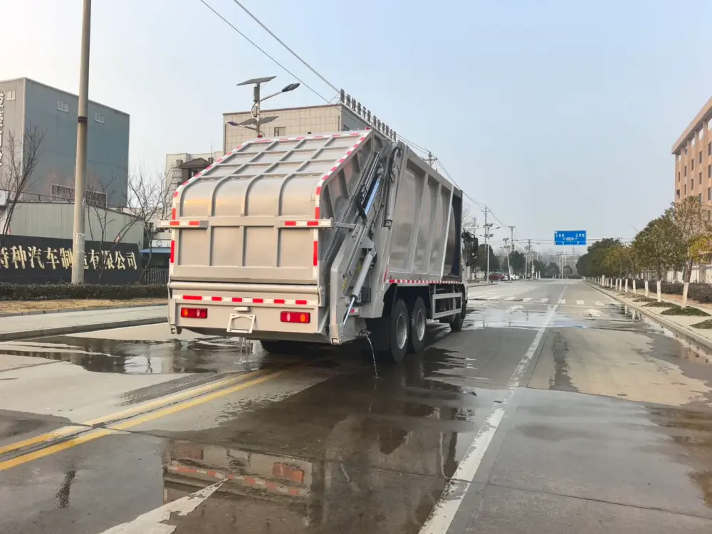 东风新汽d3l-后双桥26-28方-压缩式垃圾车-后侧45度-02 东风新汽D3L后双桥26-28方压缩式垃圾车