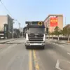 东风新汽d3l-后双桥26-28方-压缩式垃圾车-正前外观 东风新汽D3L后双桥26-28方压缩式垃圾车